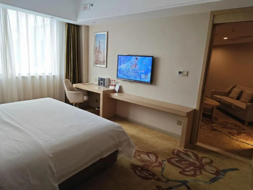 Bed in Vienna Hotel Guangxi Wuzhou High-Tech