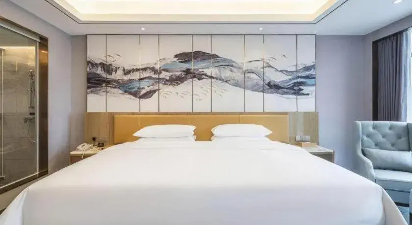 Bed in Venus Royal Hotel Guangxi Wuzhou Sanqicheng Meiguihu Park Bed in Venus Royal Hotel Guangxi Wuzhou Sanqicheng Meiguihu Park