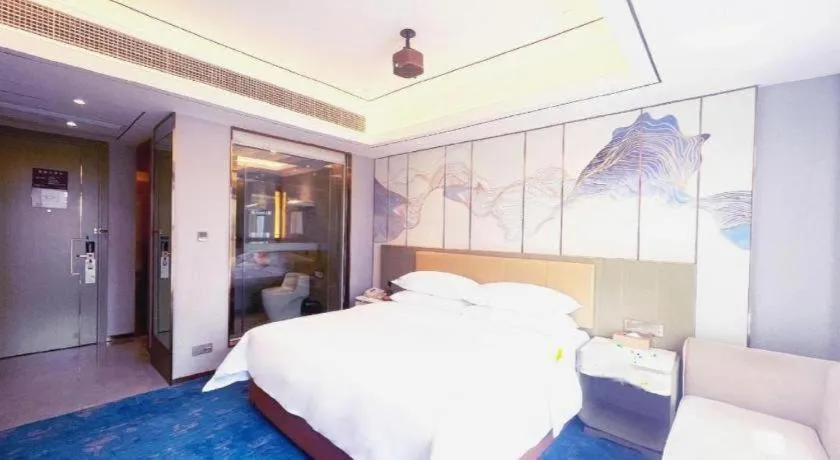 Bed in Venus Royal Hotel Guangxi Wuzhou Sanqicheng Meiguihu Park