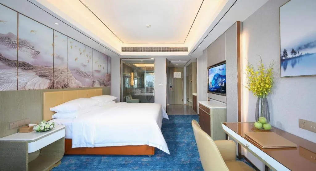 Bed in Venus Royal Hotel Guangxi Wuzhou Sanqicheng Meiguihu Park