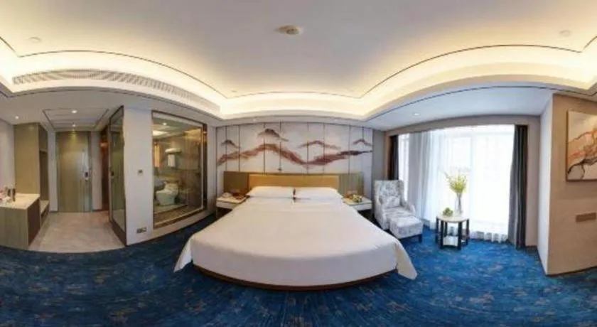 Bed in Venus Royal Hotel Guangxi Wuzhou Sanqicheng Meiguihu Park