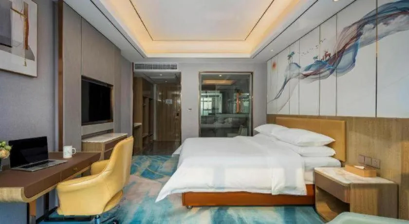 Bed in Venus Royal Hotel Guangxi Wuzhou Sanqicheng Meiguihu Park