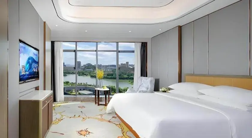 Bed in Venus Royal Hotel Guangxi Wuzhou Sanqicheng Meiguihu Park Bed in Venus Royal Hotel Guangxi Wuzhou Sanqicheng Meiguihu Park