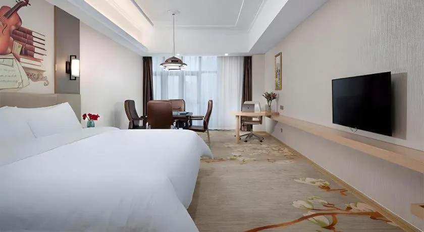 Bed in Vienna Hotel Anhui Taihe Baitai Xingma International