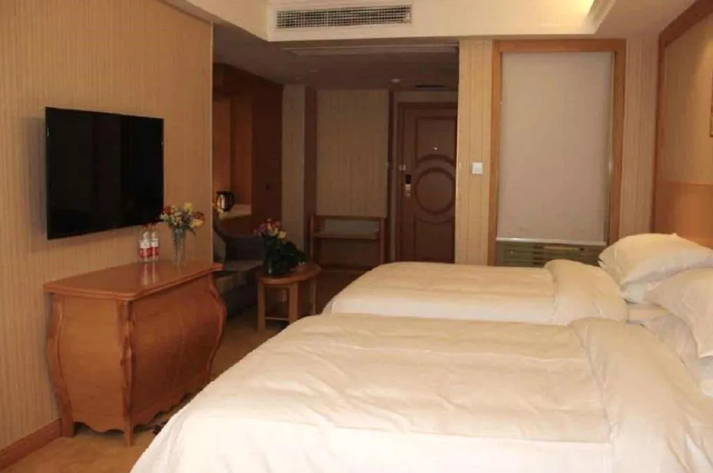 Bed in Vienna Hotel Anhui Taihe Baitai Xingma International