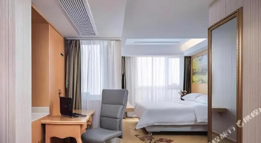 Bed in Vienna Hotel Anhui Taihe Baitai Xingma International