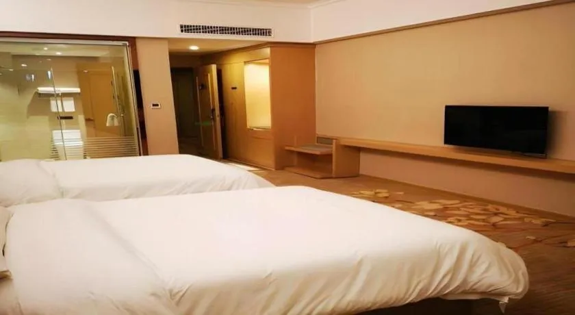 Bed in Vienna Hotel Anhui Taihe Baitai Xingma International