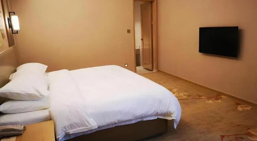 Bed in Vienna Hotel Anhui Taihe Baitai Xingma International