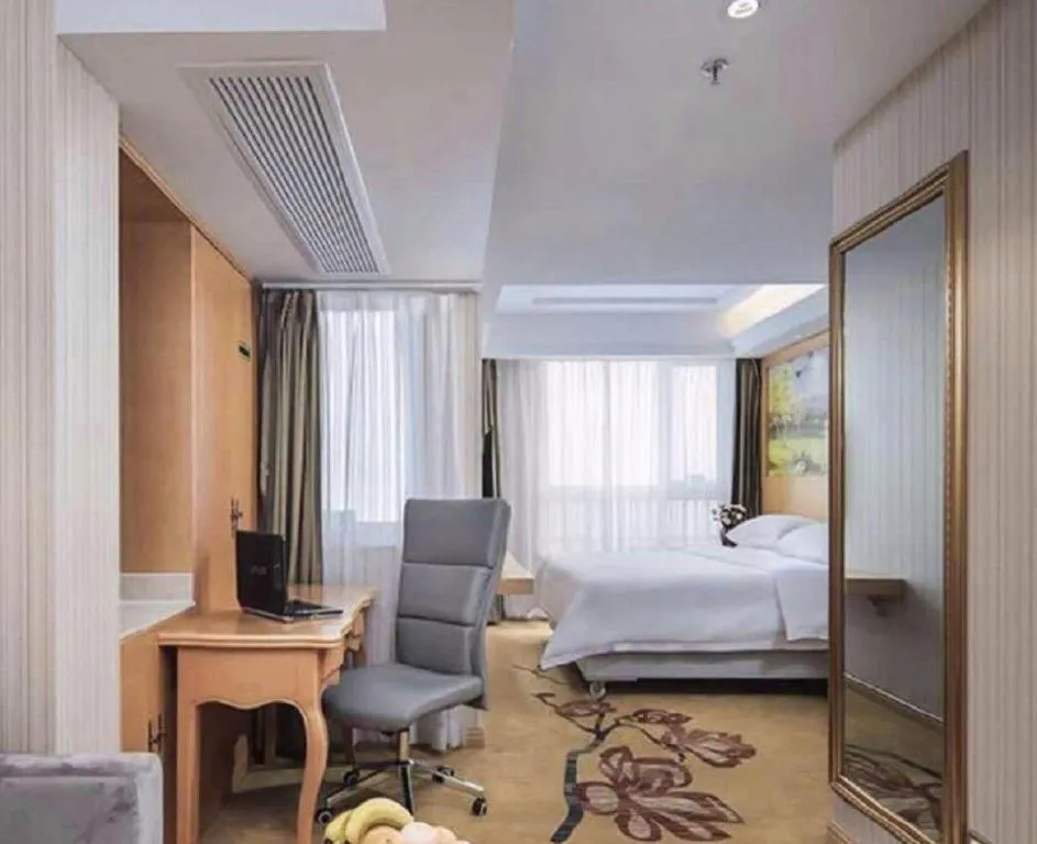 Bed in Vienna Hotel Anhui Taihe Baitai Xingma International