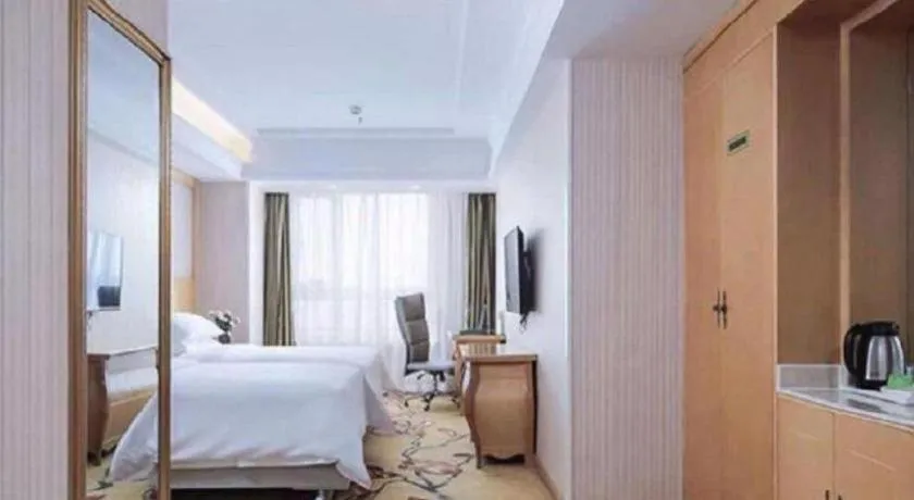 Bed in Vienna Hotel Anhui Taihe Baitai Xingma International