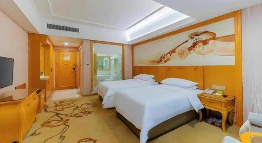 Bed in Vienna Hotel Guangdong Boluo Fu Mountain Scenic Spot
