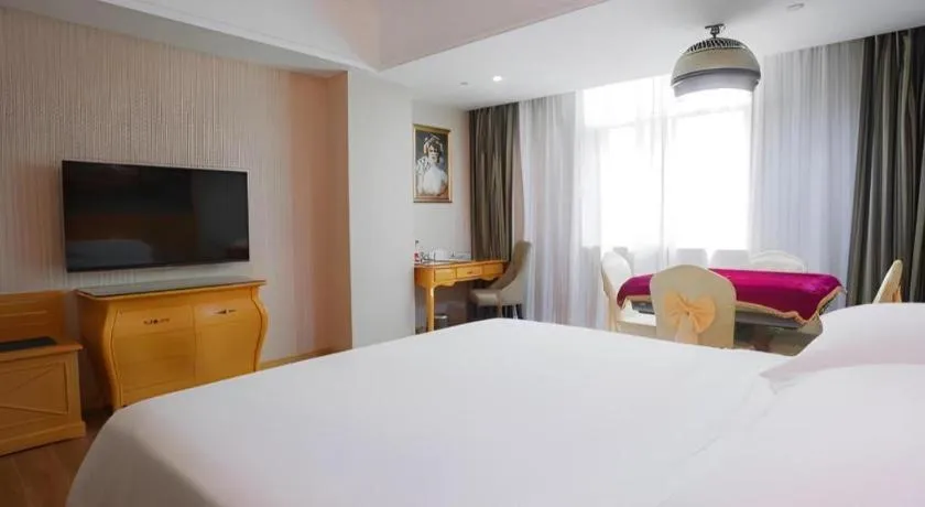 Bed in Vienna Hotel Guangdong Boluo Fu Mountain Scenic Spot