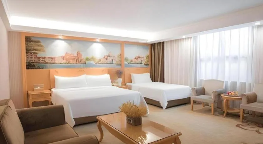Bed in Vienna Hotel Guangdong Boluo Fu Mountain Scenic Spot