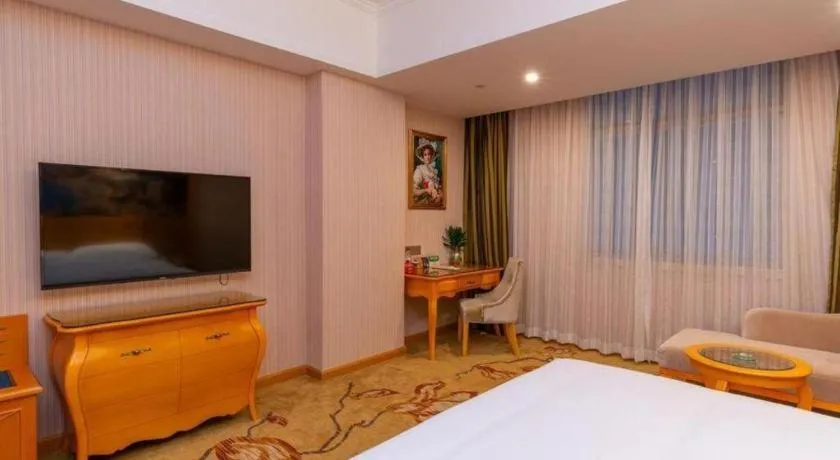 Bed in Vienna Hotel Guangdong Boluo Fu Mountain Scenic Spot