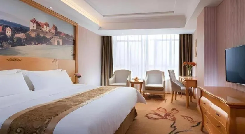 Bed in Vienna Hotel Guangdong Boluo Fu Mountain Scenic Spot