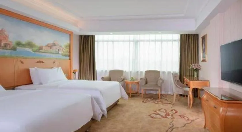 Bed in Vienna Hotel Guangdong Boluo Fu Mountain Scenic Spot