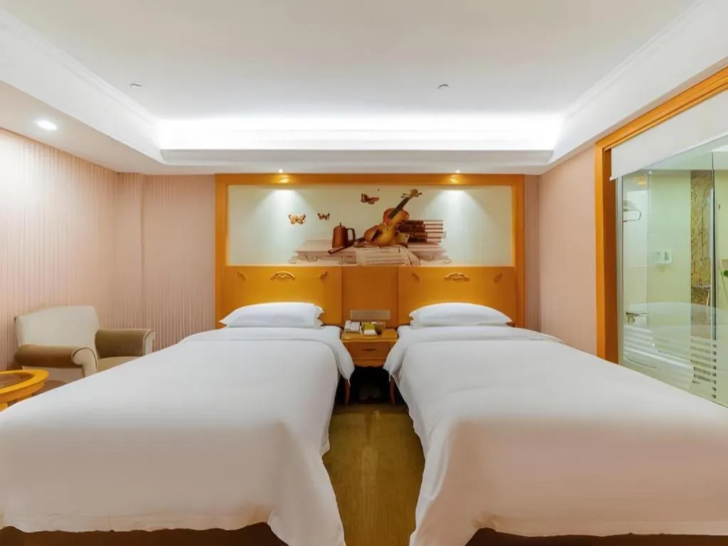 Bed in Vienna Hotel Guangdong Boluo Fu Mountain Scenic Spot