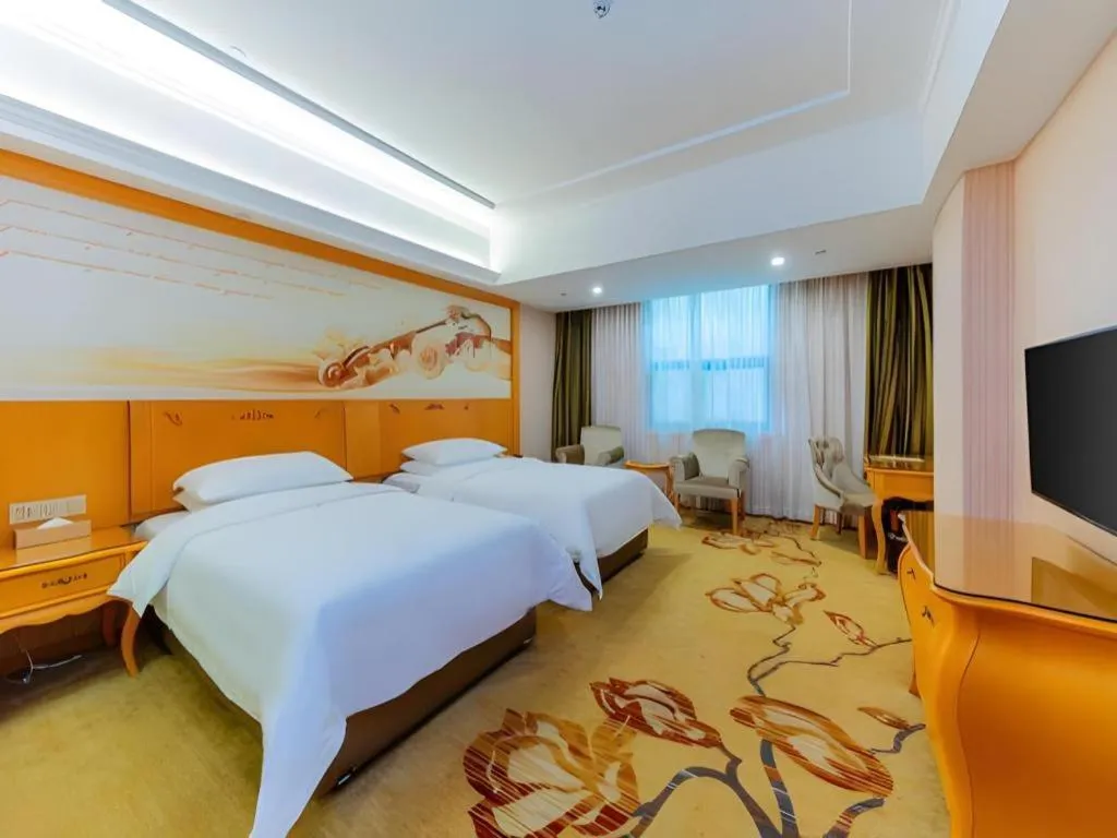 Bed in Vienna Hotel Guangdong Boluo Fu Mountain Scenic Spot
