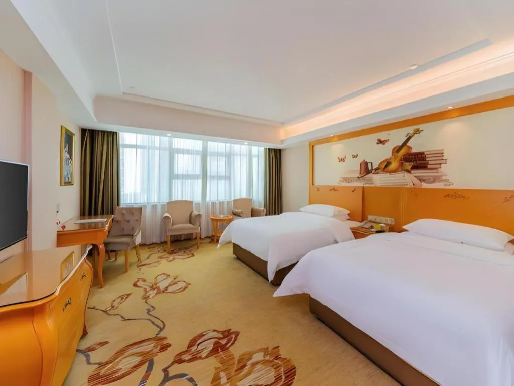 Bed in Vienna Hotel Guangdong Boluo Fu Mountain Scenic Spot