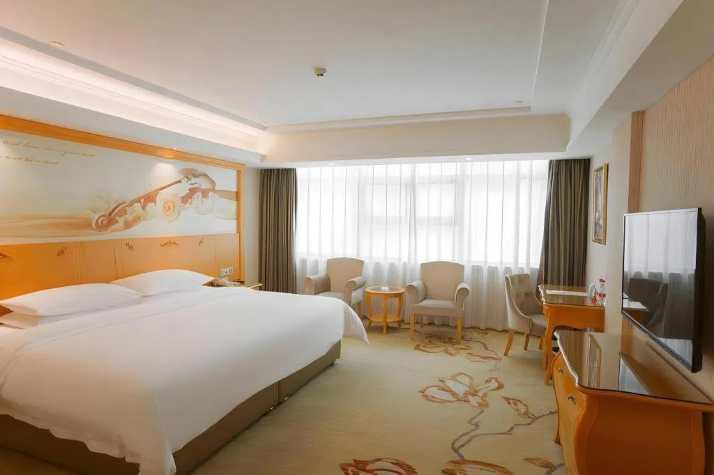 Bed in Vienna Hotel Guangdong Boluo Fu Mountain Scenic Spot