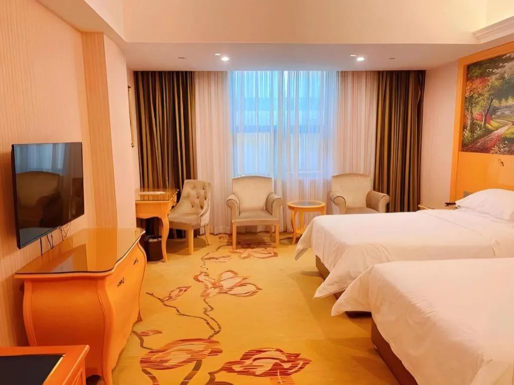 Bed in Vienna Hotel Guangdong Boluo Fu Mountain Scenic Spot