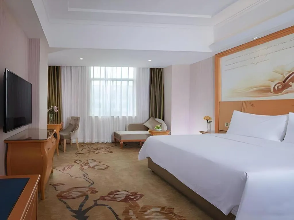 Bed in Vienna Hotel Guangdong Boluo Fu Mountain Scenic Spot