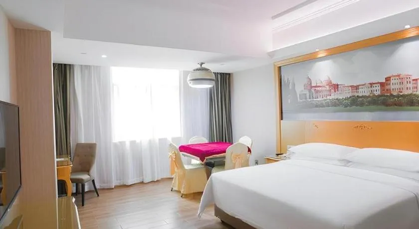 Bed in Vienna Hotel Guangdong Boluo Fu Mountain Scenic Spot