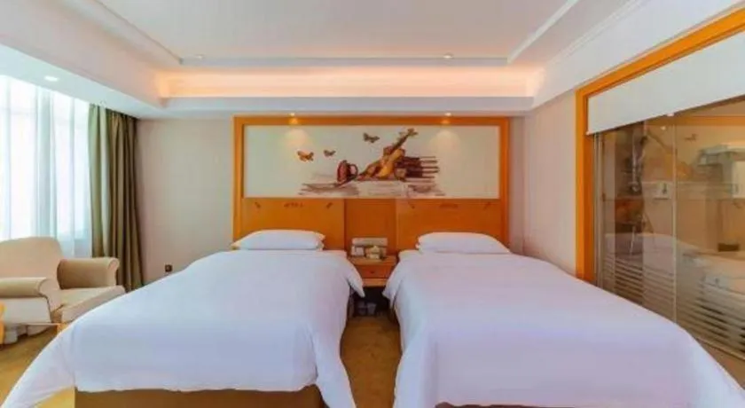 Bed in Vienna Hotel Guangdong Boluo Fu Mountain Scenic Spot