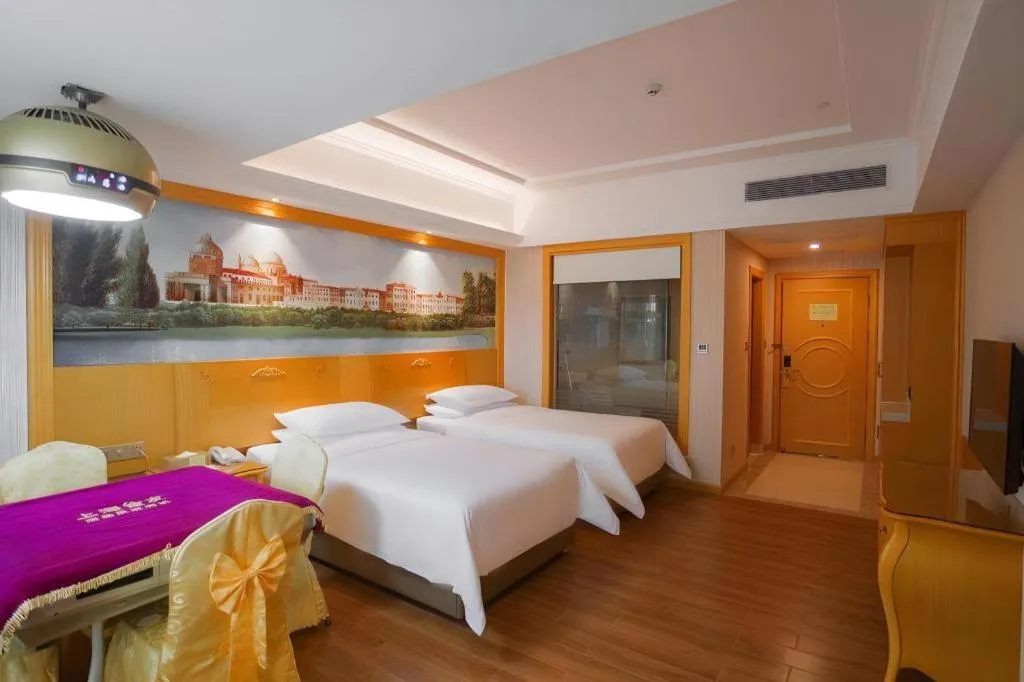 Bed in Vienna Hotel Guangdong Boluo Fu Mountain Scenic Spot
