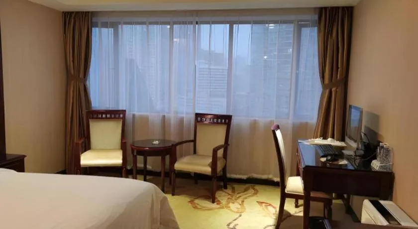 Bed in Vienna Hotel Guangdong Boluo Fu Mountain Scenic Spot