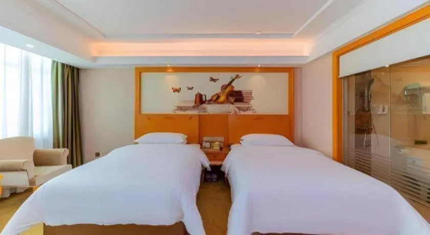 Bed in Vienna Hotel Guangdong Boluo Fu Mountain Scenic Spot