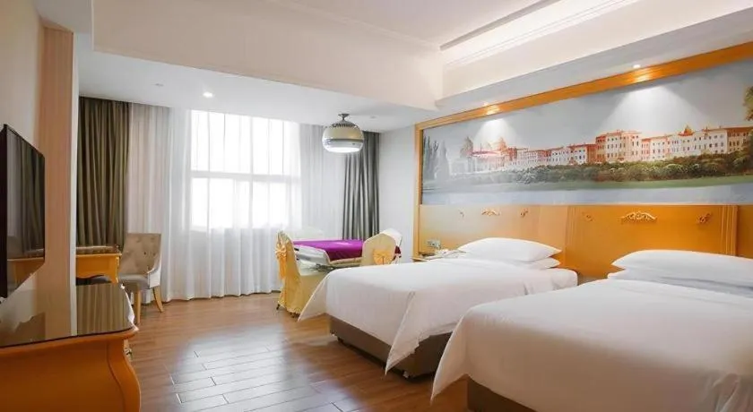 Bed in Vienna Hotel Guangdong Boluo Fu Mountain Scenic Spot