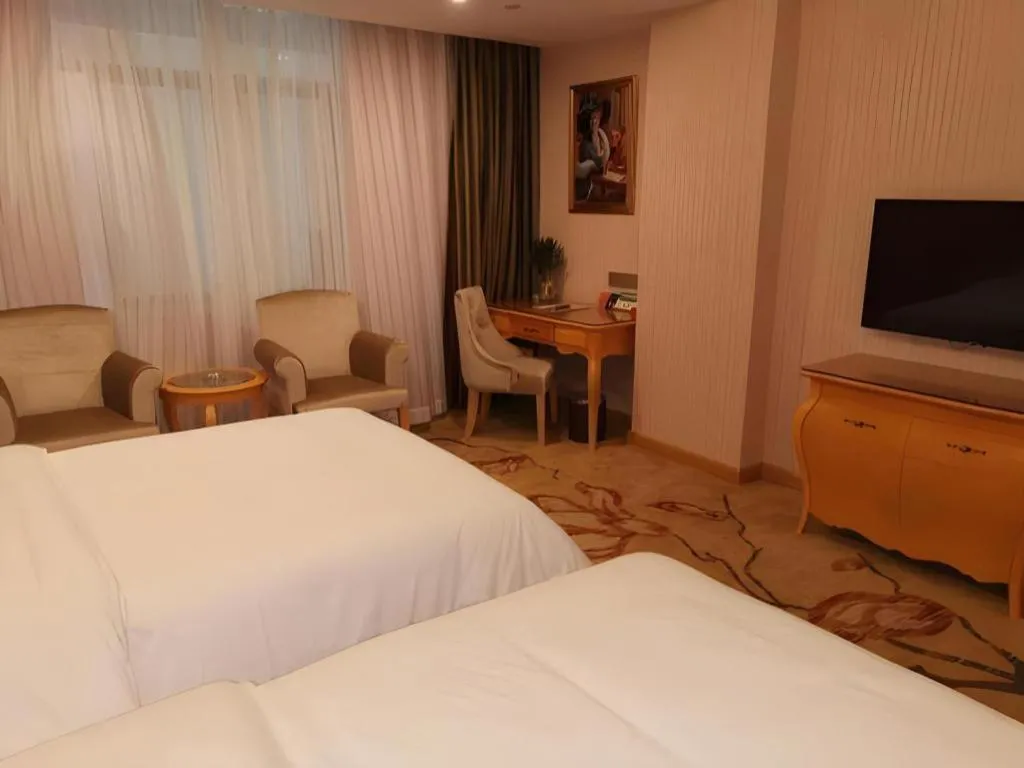 Bed in Vienna Hotel Guangdong Boluo Fu Mountain Scenic Spot