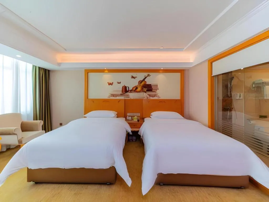 Bed in Vienna Hotel Guangdong Boluo Fu Mountain Scenic Spot