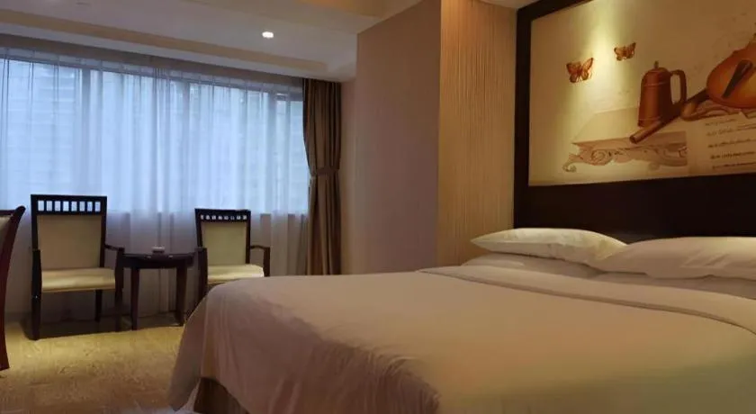 Bed in Vienna Hotel Guangdong Boluo Fu Mountain Scenic Spot