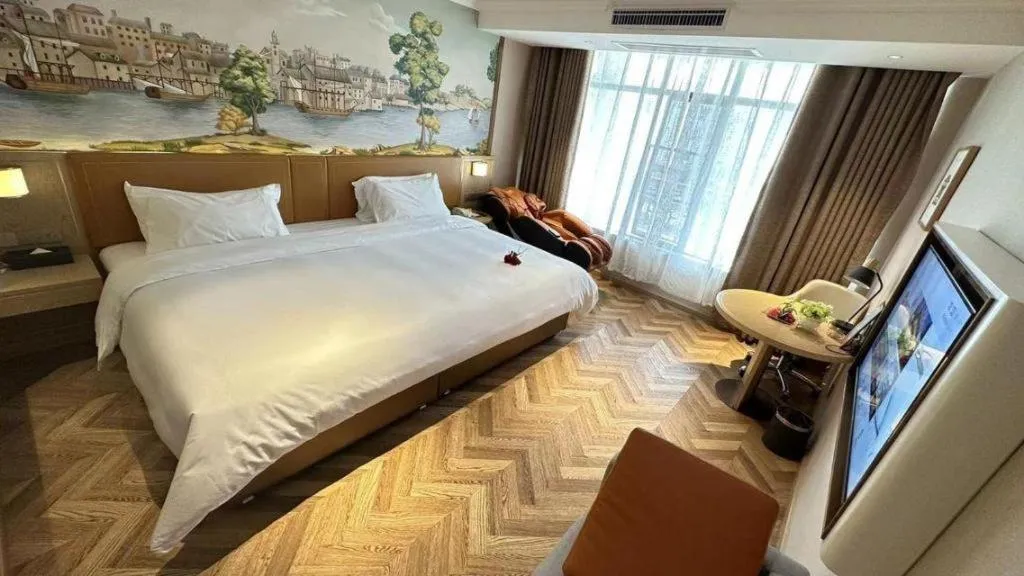 Bed in Vienna Hotel Jiangxi Ganzhou Ningdu Bus Station