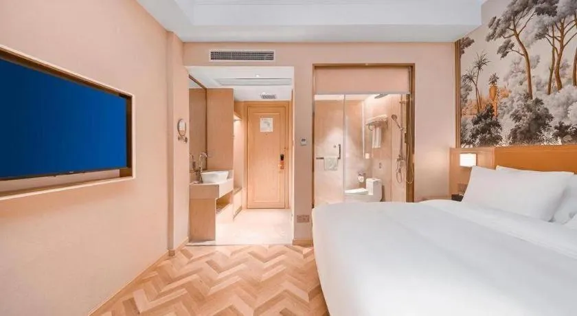 Bed in Vienna Hotel Jiangxi Ganzhou Ningdu Bus Station