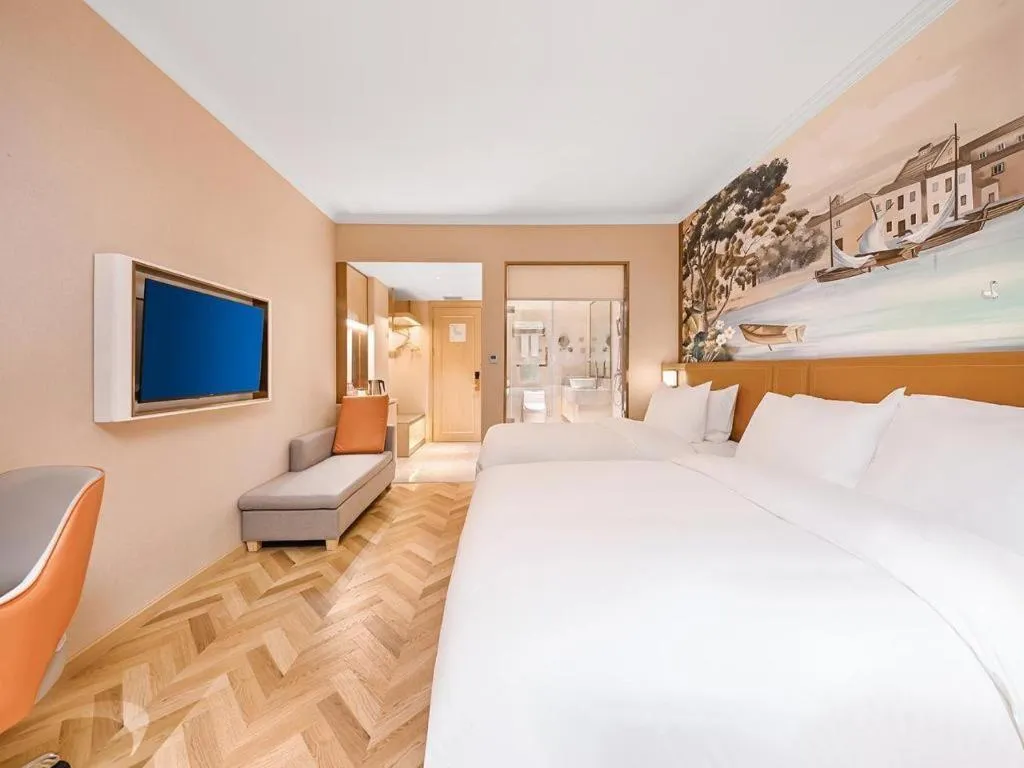 Bed in Vienna Hotel Jiangxi Ganzhou Ningdu Bus Station