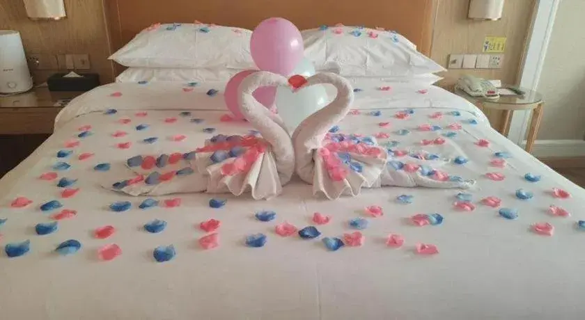 Bed in Vienna Hotel Jiangxi Ganzhou Ningdu Bus Station Bed in Vienna Hotel Jiangxi Ganzhou Ningdu Bus Station