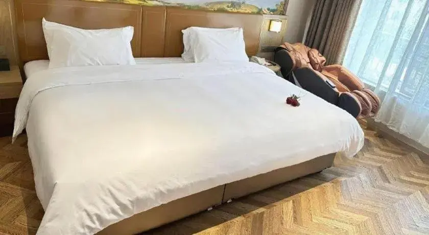 Bed in Vienna Hotel Jiangxi Ganzhou Ningdu Bus Station Bed in Vienna Hotel Jiangxi Ganzhou Ningdu Bus Station