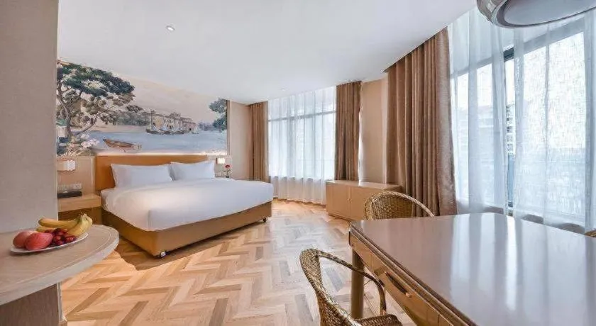 Bed in Vienna Hotel Jiangxi Ganzhou Ningdu Bus Station