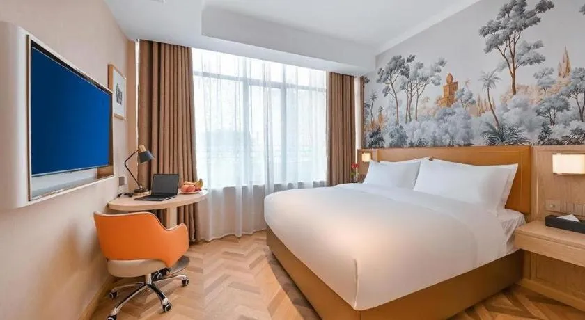 Bed in Vienna Hotel Jiangxi Ganzhou Ningdu Bus Station