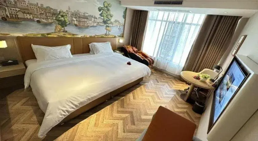 Bed in Vienna Hotel Jiangxi Ganzhou Ningdu Bus Station Bed in Vienna Hotel Jiangxi Ganzhou Ningdu Bus Station