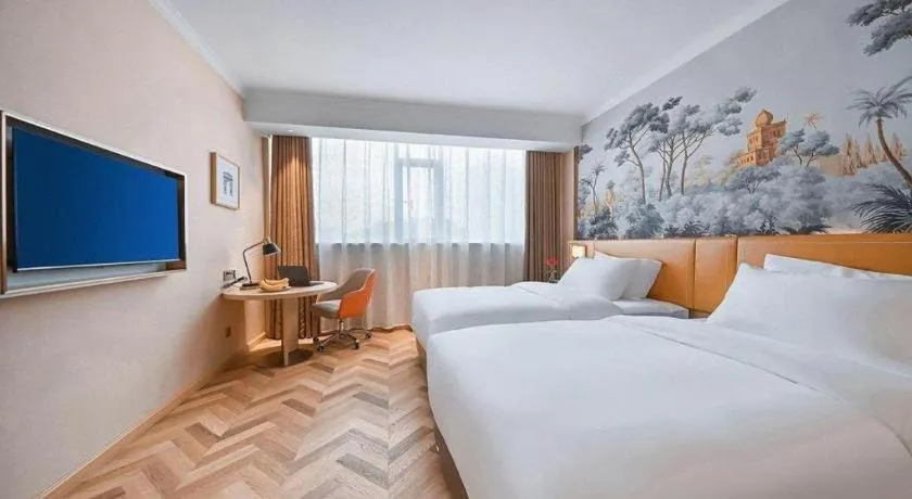 Bed in Vienna Hotel Jiangxi Ganzhou Ningdu Bus Station