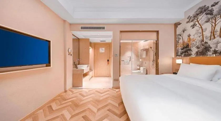 Bed in Vienna Hotel Jiangxi Ganzhou Ningdu Bus Station