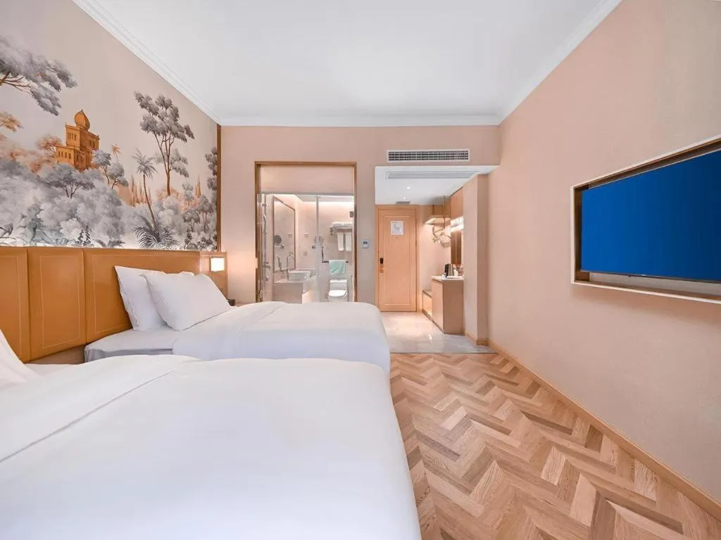 Bed in Vienna Hotel Jiangxi Ganzhou Ningdu Bus Station