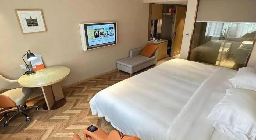 Bed in Vienna Hotel Jiangxi Ganzhou Ningdu Bus Station