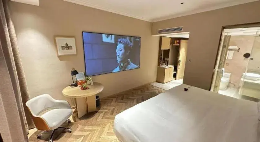 Bed in Vienna Hotel Jiangxi Ganzhou Ningdu Bus Station Bed in Vienna Hotel Jiangxi Ganzhou Ningdu Bus Station