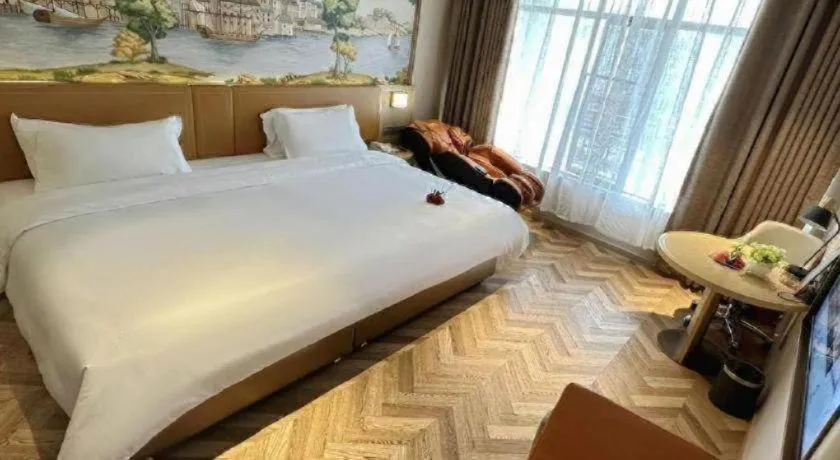 Bed in Vienna Hotel Jiangxi Ganzhou Ningdu Bus Station