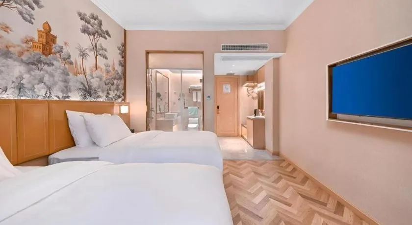 Bed in Vienna Hotel Jiangxi Ganzhou Ningdu Bus Station